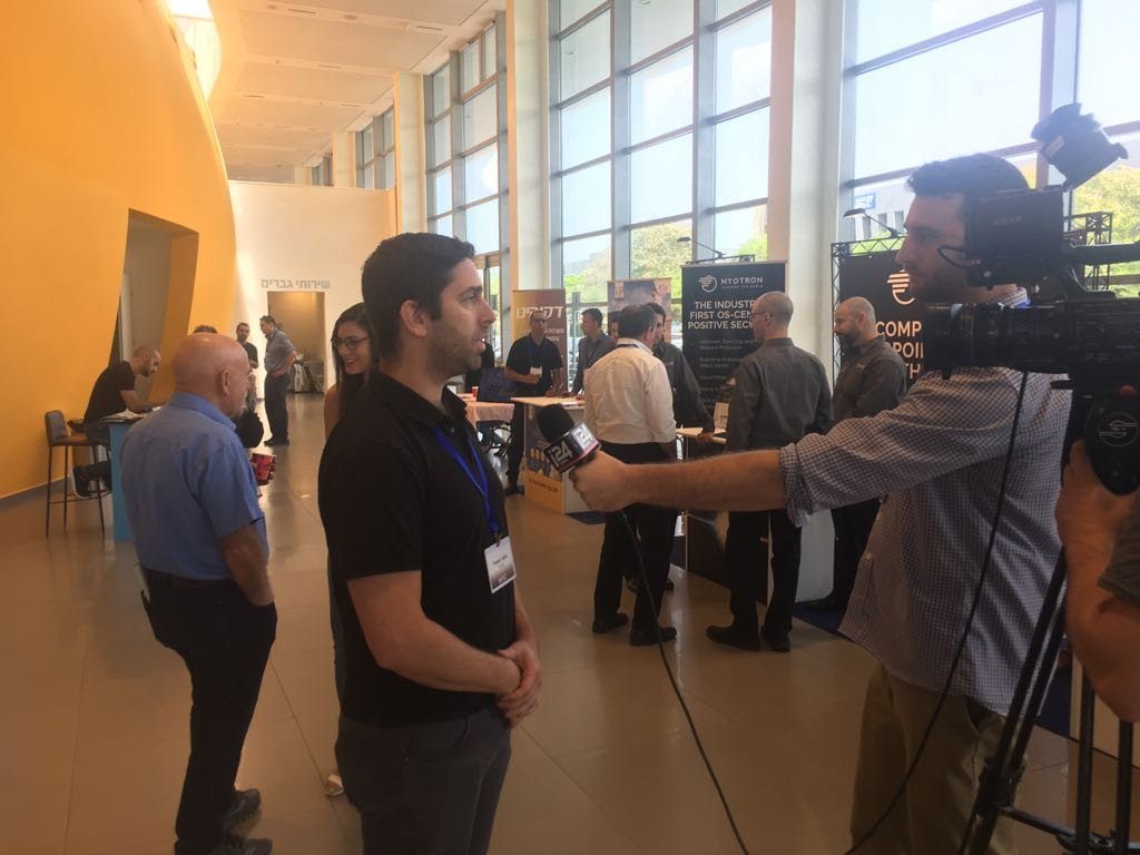 Elad being interviewed at a conference