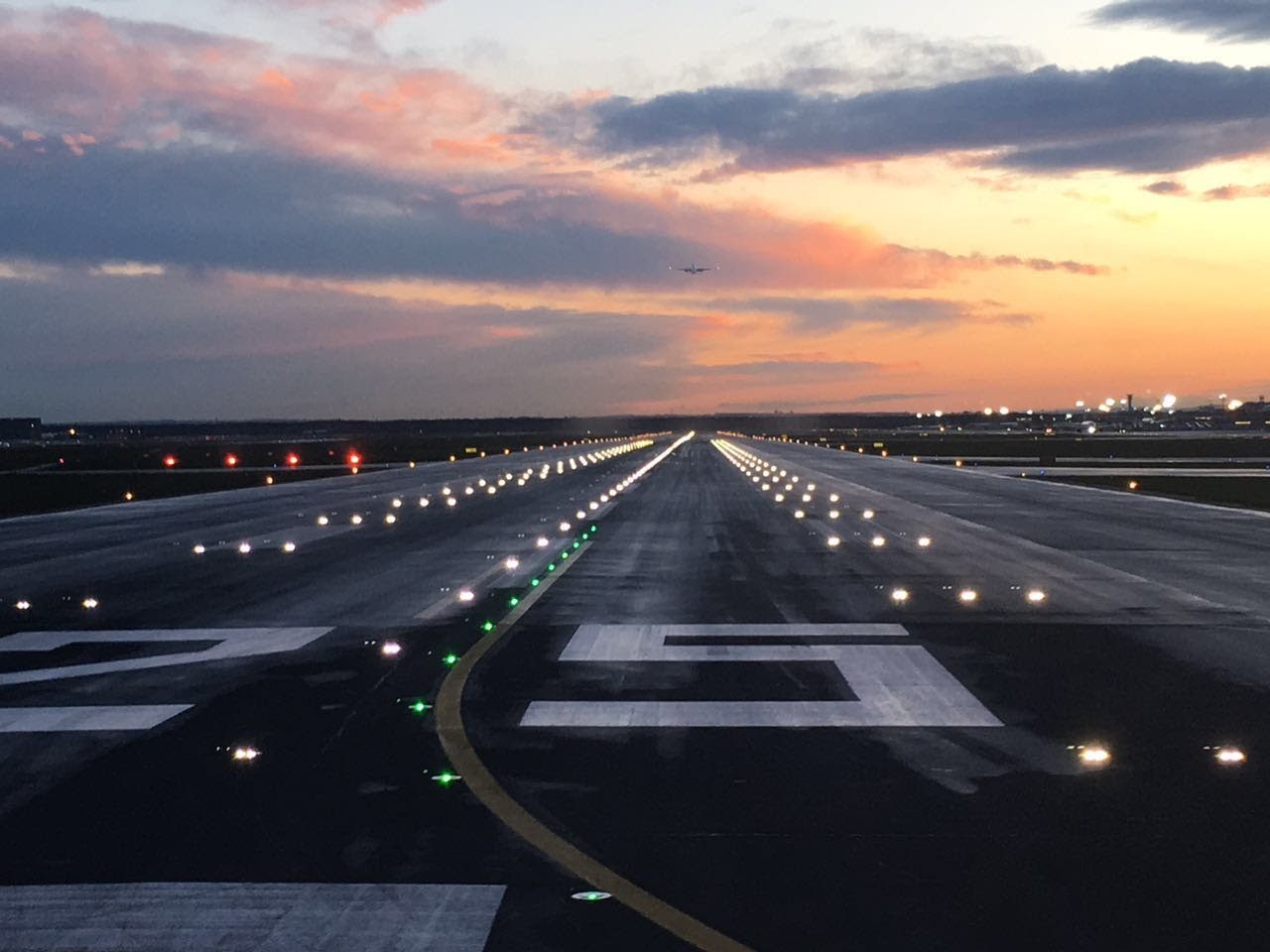 787 on the runway at sunset